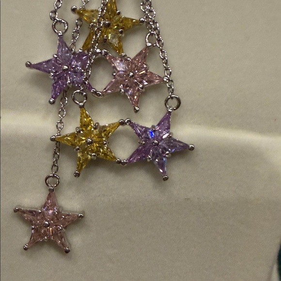 Elegant Silver and Gold Star Necklace - Picture 5 of 11